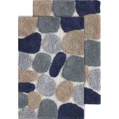 two rugs with different colored rocks on them