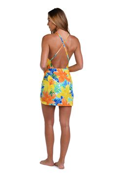 This bright and cheerful floral print has a summery vibe, perfect for a beach day. This short pareo features a one-size-fits-all design which provides a custom fit, and the side tie keeps everything undercover. [split] Details Short pareo cover up Adjustable wrap tie Tassel trim One size fits all Fabric 100% Rayon Crepe Hawaiian Style Swimwear For Summer Outings, Hawaiian Summer Swimwear, Summer Floral Print Swimwear For Beach, Summer Floral Print Beach Cover-up Swimwear, Spring Beach Party Swimwear With Vibrant Print, Spring Beach Sarong With Tropical Print, Summer Sarong For Beach Party In Spring, Hawaiian Swimwear For Beach Season, Printed Summer Sarong