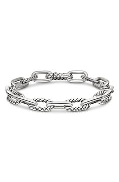 This chunky chain bracelet features alternating twisted and smooth links made of sterling silver and adds polished shine to any wrist stack. 7 1/2" length Push-clasp closure Sterling silver Imported Yurman Bracelet, David Yurman Bracelet, Small Bracelets, Women's Bracelets, David Yurman Jewelry, Bead Bangles, Silver Chain Bracelet, Sterling Silver Bracelet, High Jewelry