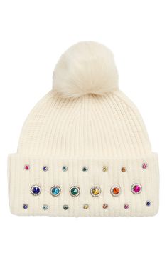 A faux-fur pompom furthers the coziness of a ribbed beanie with rainbow-hued crystals for added spunk and shine. Acrylic shell and faux-fur pompom Spot clean Imported Fur Pom Pom Beanie, Floppy Hats, Rainbow Crystal, Faux Fur Pom Pom, Cold Weather Accessories, Pom Beanie, Fur Pom Pom, Kurt Geiger, Beanie Hats