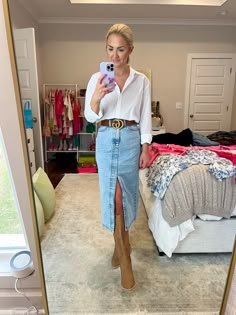 How to style a jean midi skirt for the spring and summer with western boots! Long Jean Skirt Outfits For Work, Denim Skirts With Boots, Western Boot With Skirt, Midi Jean Dress Outfit, Cowboy Boots With Midi Skirt, Demin Dress With Boots, Long Denim Skirt And Cowboy Boots, Long Jean Skirt Cowboy Boots, Jean Skirt Spring Outfits