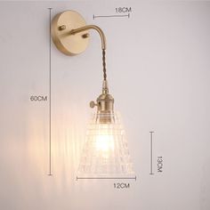 an image of a wall light with measurements