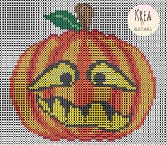 a cross stitch pumpkin with a smile on it's face and the words krea written