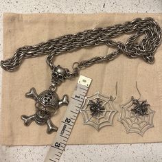 Halloween Is Coming ! Check Out These Nwot Bundle Of Jewelry To Match For The Outfit You’ll Wear That Day ! Have A Silver Heavy Necklace With Skull Pendant And A Pair Of Earrings (Web With Spider !) .Pendant With Big Skull Has Slight Discoloration At The Top Edges Of The Eye Due To Storing . Over All Good Condition And Ready To Wear. Length Of Necklace Is 17’’/Pendant Cannot Be Remove From The Chain . Final Sales Heavy Necklace, Spider Pendant, Halloween Is Coming, Skull Pendant, Halloween Accessories, The Outfit, That Day, The Eye, Ready To Wear