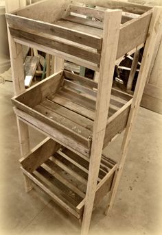 a wooden shelf sitting on top of a floor