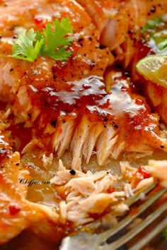 a close up of food on a plate with a fork