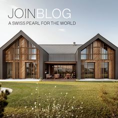 the front cover of john blog, featuring two large wooden buildings and an open lawn area