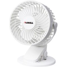 a small white fan sitting on top of a table