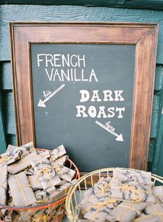 there is a basket full of food next to a sign that says french vanilla dark roast