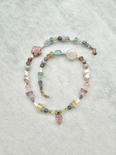 This unique necklace is one of a kind!  It features baroque pearls and stones such as * amethyst * amertine * aquamarine * prehnite * fluorite * labradorite * rhodonite & rose quartz and it's finished with a fluorite grape charm and gold vermeil findings Necklace length approximately - 17" /43cm Keep away from water. Avoid direct contact with perfumes and chemicals. Remove before showering or swimming. Rainbow Beaded Necklace, Rose Quartz Jewelry, Jewellery Sketches, Labradorite Necklace, Quartz Jewelry, Rainbow Beads, Labradorite Necklaces, Necklace Pearl, Unique Necklace