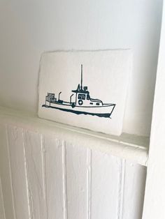 a boat is drawn on the side of a wall