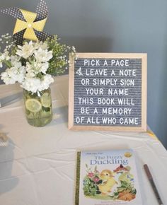 there is a sign that says pick a page and leave a note or simply sign your name this book will be a memory of all who came