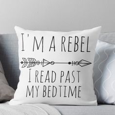 a pillow that says i'm a rebel, i read past my bedtime