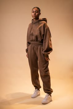 Our bestseller of all time. Sizes XS, S, M, L, and XL are available for order. The set is already oversized, so do not go a size up. Models are wearing size S. The hoodie is cropped but comfortable and not too short. The sleeves and long and puffy. The joggers are high waisted and we call them the Jasmine joggers, they fit exactly like the pants of the cartoon character. Both the joggers and hoodies are made of cotton/poly blend (40% cotton and 60% poly) with a comfy fleece inside. The ultimate Two Piece Sweat Suit Outfit, Sweatpants And Hoodie Outfit, Sweatpants Outfit Fall, Sweat Suits Outfits, 2 Piece Sweater, Matching Tracksuit, Hoodie And Sweatpants Set, Sweatpants And Hoodie, Hoodie And Joggers