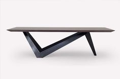 a wooden table with black metal legs