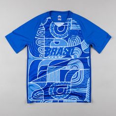 a blue t - shirt with an abstract design on the front and back, that says brasil