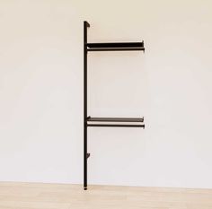 Retail Display Shelving with 2 Shelves + 2 Hanger Bars Minimalist Retail Display, Retail Display Floating Shelves, Minimal Retail Display, White Retail Shelving, Black Retail Shelving, Shelf Hanger, Hanging Bar, Retail Experience, Modern Shelving