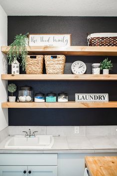 the kitchen is clean and ready to be used as a laundry room or office space