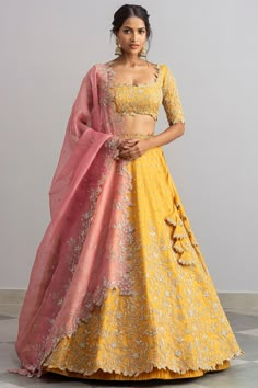 Featuring a mustard lehenga in organza base with cutdana cutwork. It is paired with a matching blouse and a pink dupatta.  FIT: Fitted at bust and waist. COMPOSITION: Organza. CARE: Dry clean only. Lehenga Yellow, Sari Lehenga, Blouse Lehenga, Haldi Outfits, Bridal Lehenga Designs, Anushree Reddy, Yellow Lehenga, Organza Lehenga, Gaun Fashion