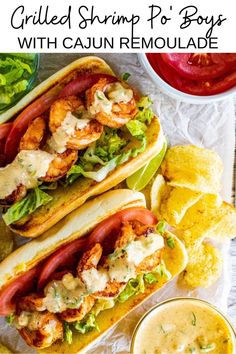 two grilled shrimp po'boys with cajun remoulade and chips