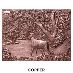 copper colored metal wall art depicting a deer in a forest