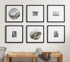 four black and white pictures hang on the wall above a bench with a hat sitting on it