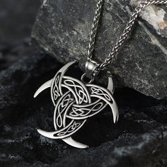 The Triple Horns of Odin Necklace: Also named as The Horn Triskelion, the drinking vessels that are traditional to Norse toasting rituals and connected to mythological stories of Odin. Used as a symbol of Wisdom and Inspiration, poetic inspiration in particular.  Made of high-grade 316L stainless steel, this Odin necklace is hypoallergenic and comfortably fits your skin.   SPU:TP12686  Collection:Viking  Materials: Stainless Steel  Pendant Size: 1.77 inches * 1.73 inches;   Chains Length: 22 inc Horns Of Odin, Triple Horn Of Odin, Poetic Inspiration, Necklace Pendant For Men, Mythological Stories, Viking Odin, Viking Symbol, Celtic Knot Necklace, Symbol Jewelry