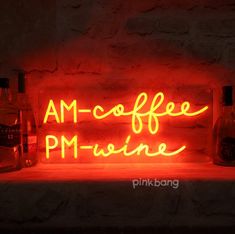 a neon sign that says am - coffee pm - meine next to two bottles