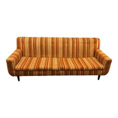 an orange and yellow striped couch on a white background