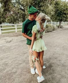 a man and woman dressed up as peter panton and the leprechaun king