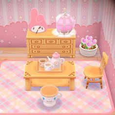 the room is decorated in pastel colors and has flowers on the table, chairs, and dresser