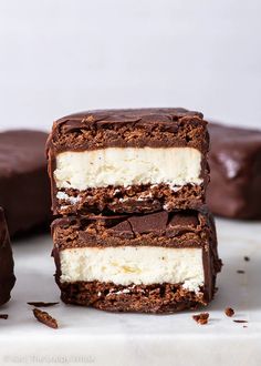 three pieces of chocolate and vanilla ice cream sandwich