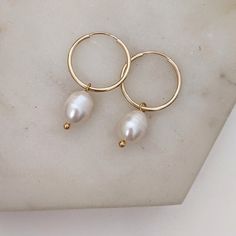 These Versatile Hoops Feature Our 16mm Essential Hoops Coupled With A Freshwater Pearl. They're Perfect For Just About Any Occasion. -Materials: Gold Filled Hoops, Freshwater Pearls *Please Note That Because These Are Made With Freshwater Pearls, There Will Be Variations Between Each Piece As No Two Are Exactly The Same. 14k Gold Hoop Earrings, Jewelry Aesthetic, Gold Leaf Earrings, Face Earrings, Gold Filled Hoops, Diamond Eyes, Love Jewelry, Mismatched Earrings, Square Earrings Studs