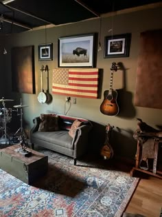 a living room filled with furniture and musical instruments on the wall above an american flag