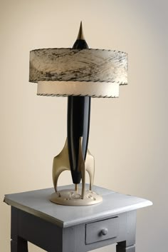 a lamp that is on top of a table