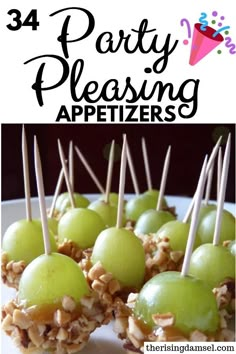 green grapes are arranged on skewers with toothpicks in them and the words, 34 party pleasing appetizers