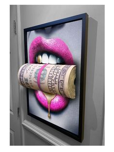 a rolled up roll of money sitting on top of a pink lipstick with the dollar bill sticking out of it