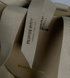 a burberry bag with a tag on it