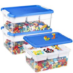 three plastic storage containers filled with legos