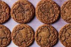 several cookies are arranged in rows on a table