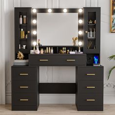 a vanity with lighted lights and drawers