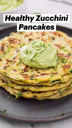 a stack of pancakes with guacamole on top