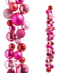 pink and red ornaments hanging from strings