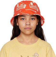 Cotton twill bucket hat in red. Logo pattern printed in white throughout. · Quilted brim · Twill browband · Machine-wash Supplier color: Red house The Animals Observatory Size: Head Circumference M: 21.25 / 54 cm L: 22.5 / 57 cm Adjustable Orange Cotton Bucket Hat, Playful Red Bucket Hat, Fun Red Adjustable Bucket Hat, Orange Cotton Bucket Hat, Red Bucket Hat For Outdoor, Casual Adjustable Orange Bucket Hat, Red Bucket Hat With Short Brim For Outdoor, Fun Red Bucket Hat, Red Fun Outdoor Hat