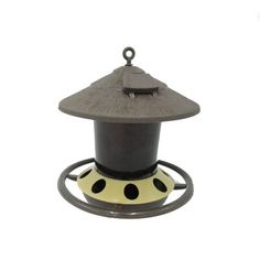 a black and yellow bird feeder on a white background