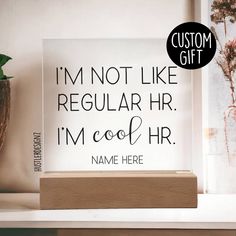 a sign that says i'm not like regular hr im cool hr name here