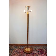 a lamp that is on top of a rug