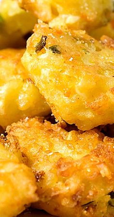 some fried food on a plate with broccoli