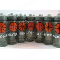 six bottles with basketballs on them sitting next to each other