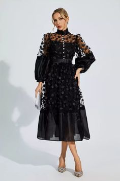 The Lillie Black Mesh Flower Midi Dress exudes elegance and sophistication. With its delicate, three-dimensional flowers and sheer mesh fabric, this dress is a true showstopper. The puff sleeves add a touch of femininity, while the waist slimming design ensures a flattering fit. Perfect for special occasions or evening events, this dress is a must-have for every fashion-forward woman.  Dress Length: Approx 123cm Materials: Polyester Gentle Dry Clean Only  The model is 5 ft 7 and wears size S  Co Dantel Dress, Svecane Haljine, Evening Wear For Women, Flower Midi Dress, Glitter Wedding Dress, Bandage Midi Dress, Woman Dress, Floral Shirt Dress, Travel Party